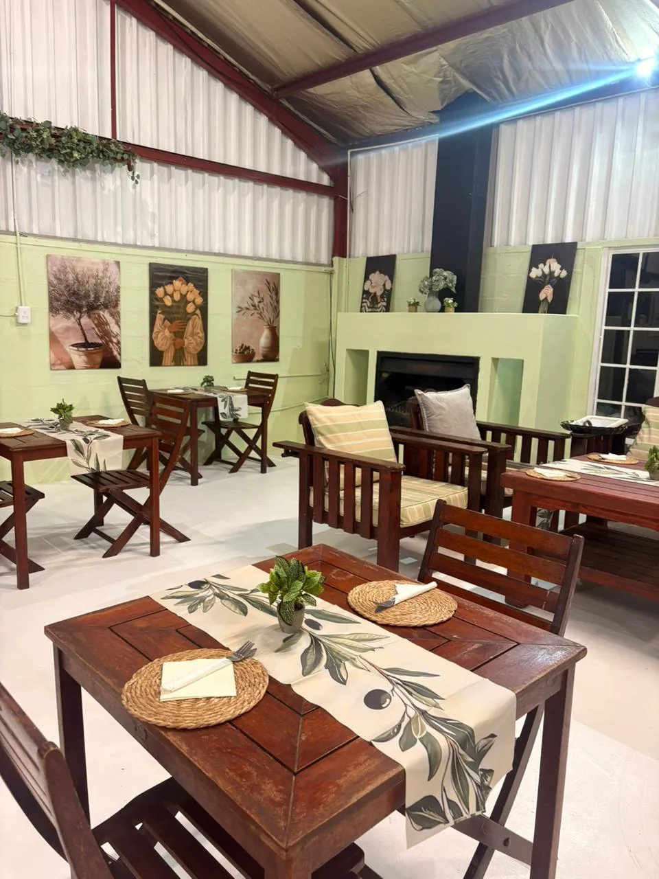 Olive & Vine dining room with fireplace, tables and warm indoor seating