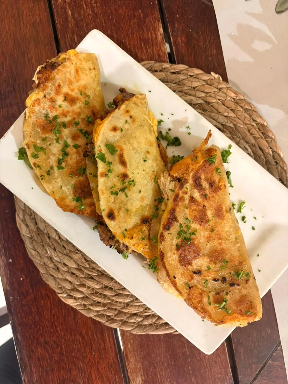 Golden toasted quesadillas with fresh herbs