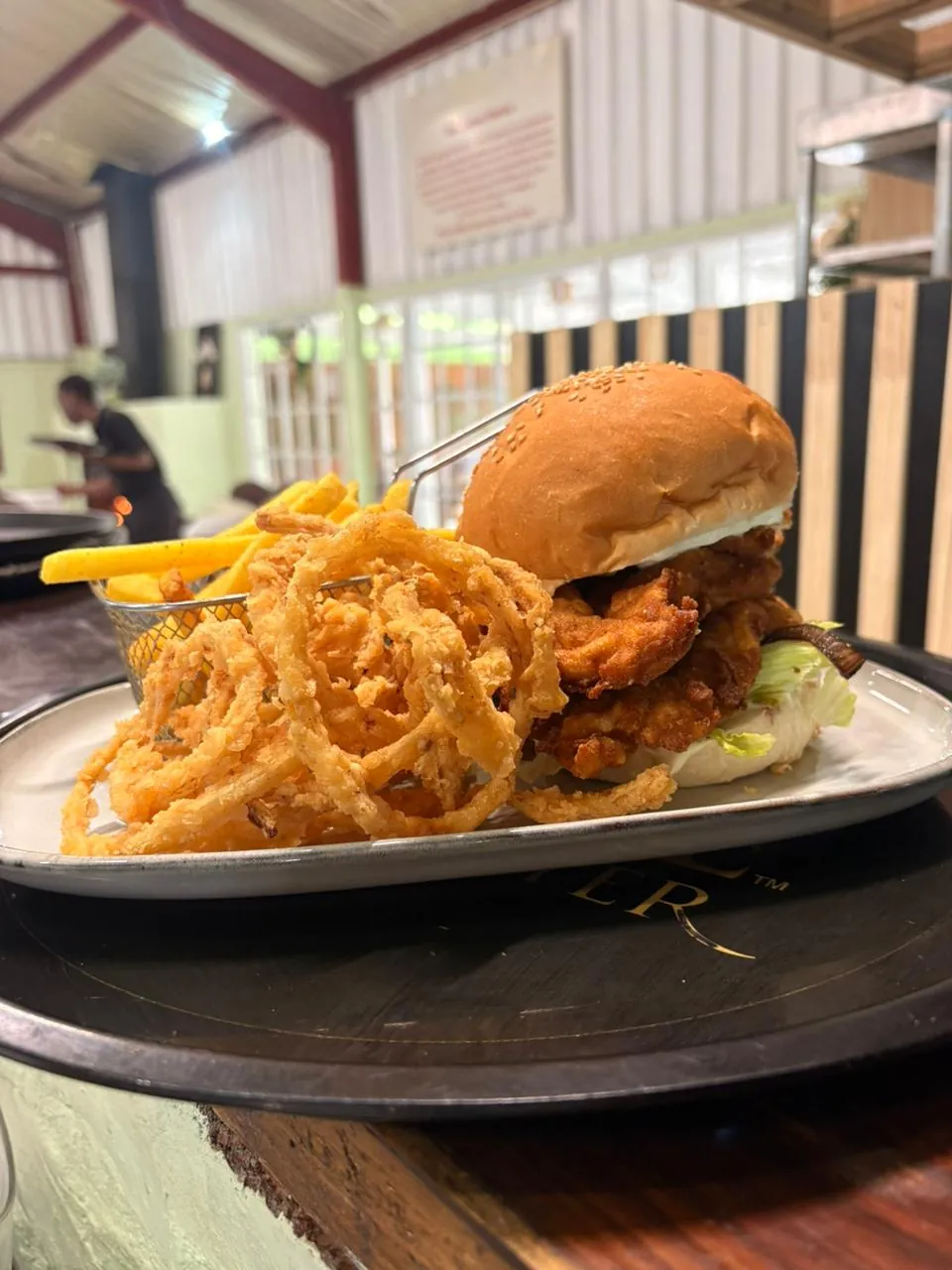 Glazed ribs served with fries and onion rings